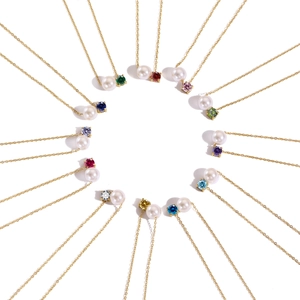 Golden stainless steel pearl and birthstone necklaces in 12 colorful zircon options