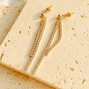Elegant gold long tassel drop earrings with double-row sparkling cubic zirconia stones