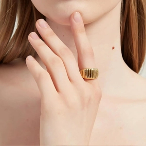 Elegant gold wide croissant dome ring with vertical ribbed texture for women