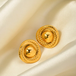 Classic 18K gold-plated teardrop earrings with twisted rope border on silk background