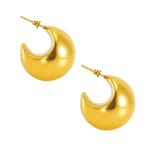 Detailed view of chunky C-shaped hoop earrings with polished gold-plated metal finish