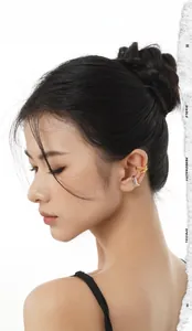 Close-up of S925 sterling silver multi-layer ear cuffs in gold and silver finish