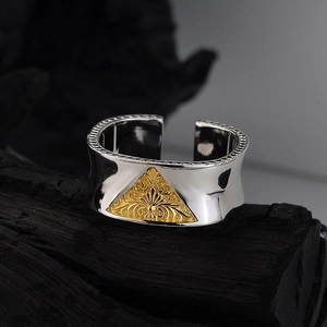 Retro S925 sterling silver open ring featuring golden floral scroll relief on black wood