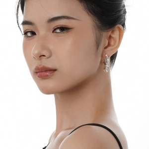 S925 sterling silver flower earrings with white pearls on a model in a side view
