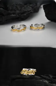 Detail of S925 sterling silver ring showing molten lava texture and gold-silver color mix