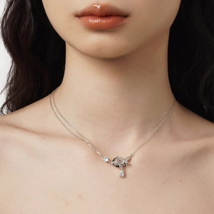 Elegant S925 sterling silver butterfly necklace with sparkling zircon droplets on a model