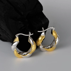 Dual-tone S925 sterling silver Mobius hoop earrings with gold and silver twisting texture