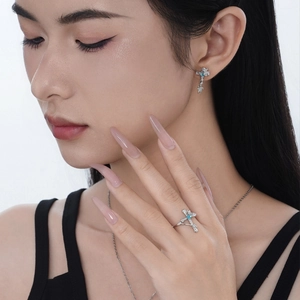 Minimalist S925 sterling silver cross jewelry set with blue turquoise stones on model