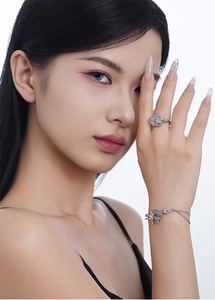 Detailed view of S925 silver dragon bracelet and ring set with translucent gemstones