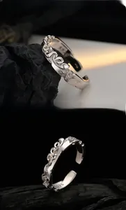 Macro shot of S925 sterling silver ring showing hallmark and sparkling zircon detail