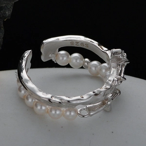 Irregular S925 sterling silver open ring with white pearls and lava metal texture