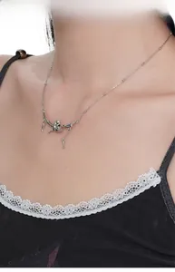 Close-up of S925 sterling silver animal pendant on a delicate beaded ball chain