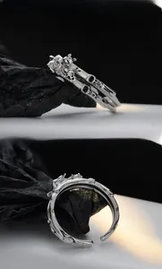 Close-up of S925 sterling silver cat ring with vintage texture and double-layer hollow design