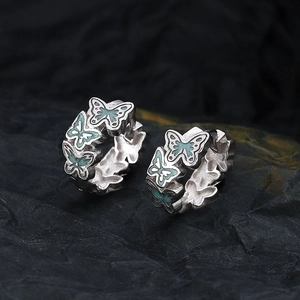 S925 sterling silver butterfly hoop earrings with teal enamel in a vintage design