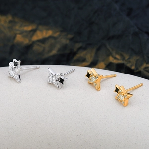 Star-shaped S925 sterling silver studs with zircons and black enamel accents
