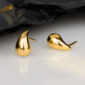 Boucles d'oreilles minimalistes gouttes d'eau en argent S925 doré sur miroir gris
