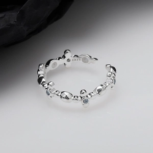 S925 sterling silver open ring with cross design and light blue gemstone inlay