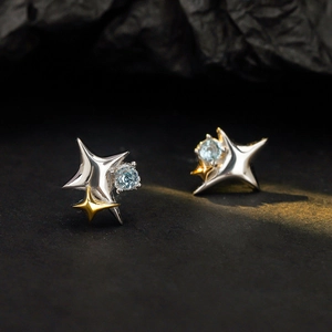 Elegant S925 sterling silver star stud earrings with blue gemstone on black stone