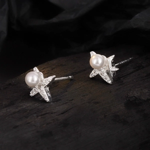 Elegant S925 sterling silver star-shaped stud earrings with white pearls and sparkling pavé