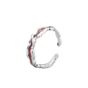 Irregular S925 sterling silver ear clip with pink enamel in a modern ripple design