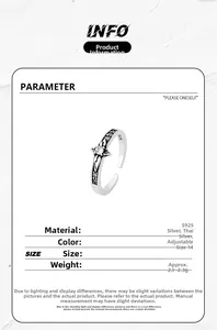 Macro detail of vintage S925 silver ring with engraved texture and gemstone settings