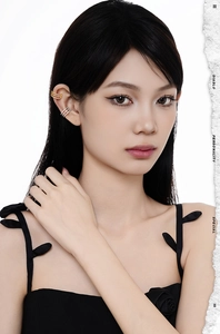 Close-up of minimalist gold triple layer and silver pavé cz ear cuffs on model