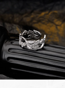 Macro shot of the S925 sterling silver hollow leaf ring with pavé-set sparkling zircons
