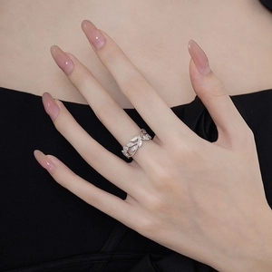 S925 sterling silver leaf ring with pavé zircons worn on hand for a minimalist nature look
