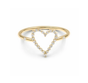 Detailed macro view of a gold heart-shaped ring with pavé-set diamonds on white background