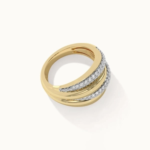 Macro detail of multilayer 925 sterling silver ring with gold plating and paved zircon stones