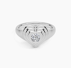 Detailed close-up of a layered heart-shaped S925 sterling silver ring with central diamond
