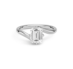 Macro detail of emerald cut square zircon ring with bypass silver band and four claws