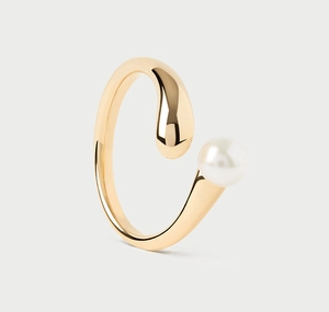 Macro detail of minimalist open ring featuring polished gold finish and a white pearl