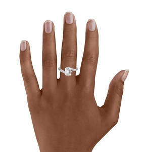 Detail of S925 silver ring with emerald cut zircon stone on model hand