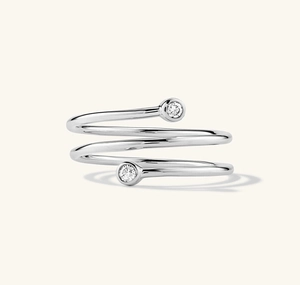 Detail of S925 sterling silver triple layer spiral ring with sparkling zircon stones