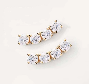 Close-up of S925 sterling silver curved stud earrings with five sparkling zircon stones