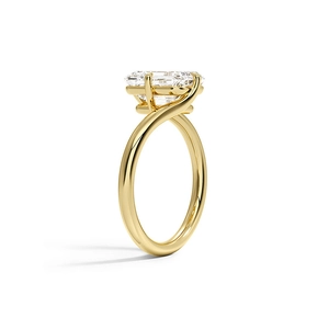 Elegant gold bypass ring with large rectangular emerald-cut zircon and twisted band