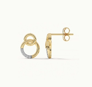 Macro view of gold S925 sterling silver interlocking rings earrings with zircon pave