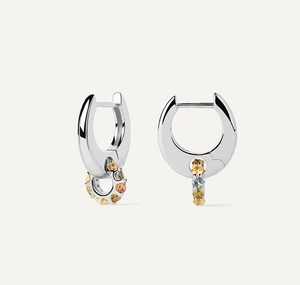 Detail of S925 silver hoop earrings with yellow and blue zircon stone pendant