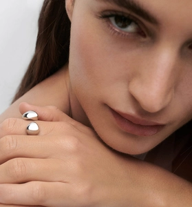 Close-up of minimalist S925 sterling silver open ring with dual spherical bead design