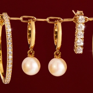 Elegant gold-plated S925 sterling silver earrings set with pearls and diamonds
