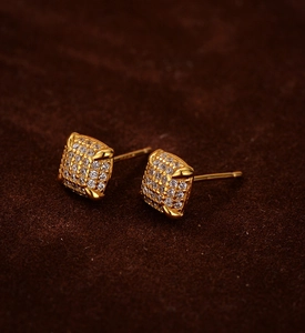 Detailed view of square 18K gold plated stud earrings with pave set zircon stones