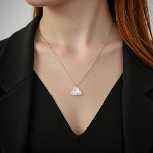 Elegant S925 sterling silver moon necklace with irregular lava texture on model