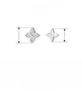 Macro view of asymmetric S925 sterling silver clover and star studs with dimensions