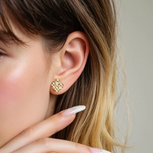 S925 silver 18K gold geometric diamond checkerboard stud earrings worn by a model