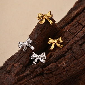 Boucles d'oreilles nœuds élégantes en argent sterling S925 coloris doré et argenté