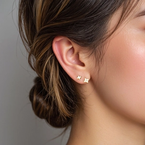 Elegant 18K gold plated S925 silver clover and star earrings set on female model