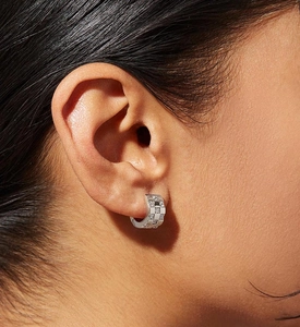 Close-up of S925 silver huggie hoop earring with micro-set checkered zircon pattern