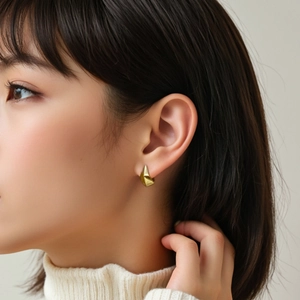 Minimalist S925 sterling silver geometric gold earrings shown on a female model