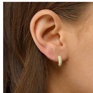 Elegance 925 silver gold plated hoop earrings with micro paved crystals on ear lobe